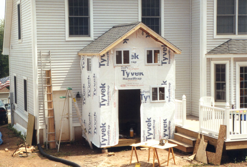 Construction involved installing a floor above the shed and extending the roof upwards.