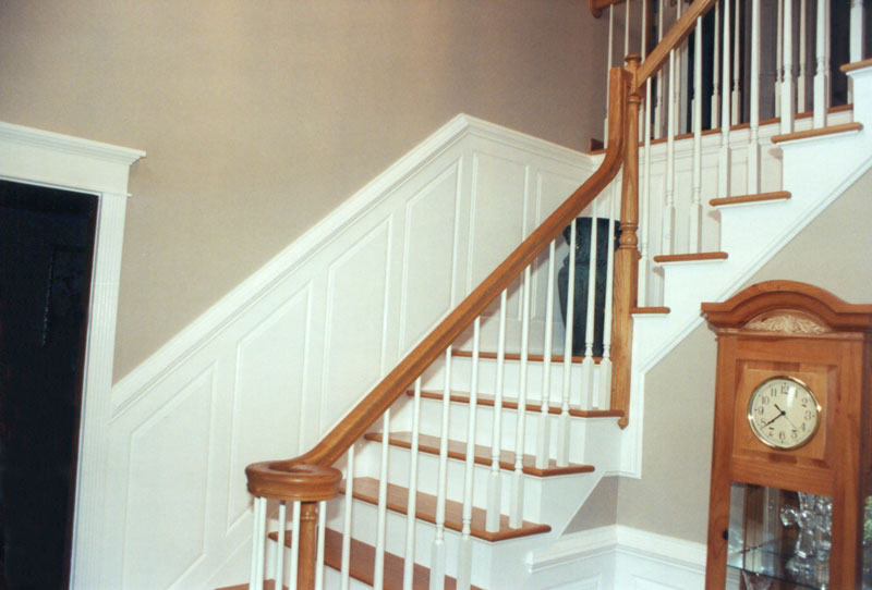 The same staircase with wainscot and contrasting paint looks very interesting.